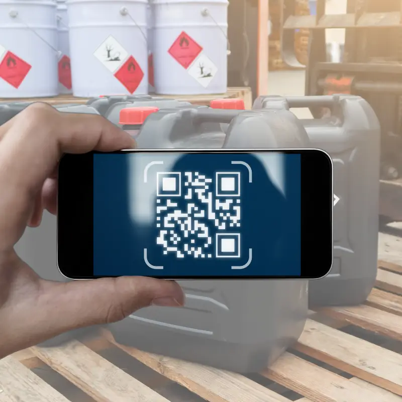 monetize-farm-data-with-blockchain-spraying-records Farmer scans pesticide container with smartphone app to capture QR code details, product name, active ingredient, batch number, manufacturing and expiry dates.