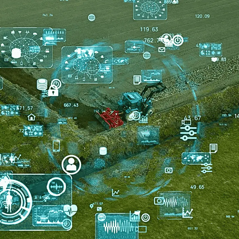precision-agriculture-smart-tractor-data-integration Tractor operating in a field surrounded by digital overlays representing data analytics, connectivity, and smart farming technologies used in precision agriculture