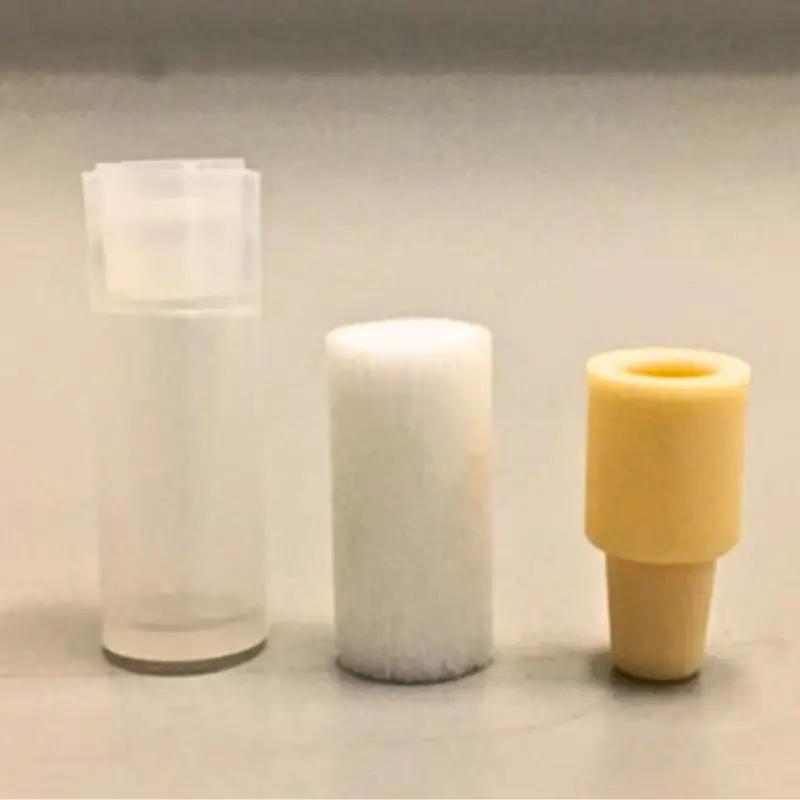 pheromone-lure-dispenser-types Three common pheromone lure dispenser types used in pest monitoring: a plastic vial, wax plug, and rubber septum